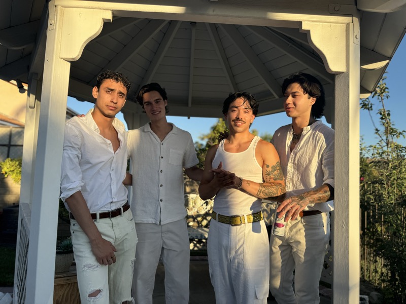 david with friends in a gazebo